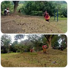 ERJA-KERJA PEMOTONGAN RUMPUT DI KAWASAN TAMAN REKREASI GEMAS